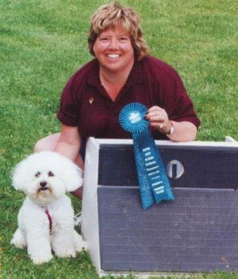 Me with my Bichon winning her first flyball title.