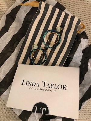 Lele Sadoughi earrings and fabric bag; striped tissue paper; personal note from boutique owner.