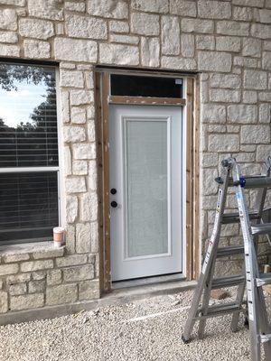 We pulled a window out and put this door and transom in for a beautiful transition into a soon-to-be gorgeous poolscaped yard.