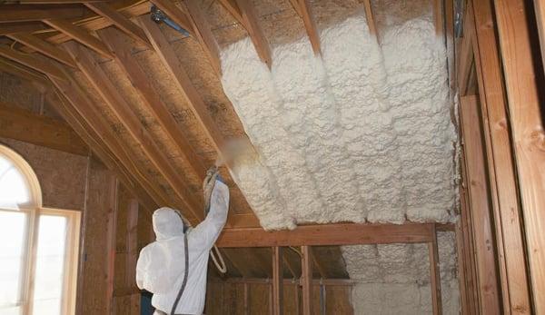 Installer adding Solar Foam to your Attic.