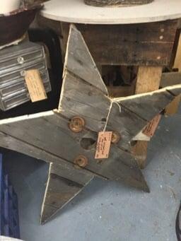 Star made from salvaged wire spool. Call (770) 362-6289 to order!