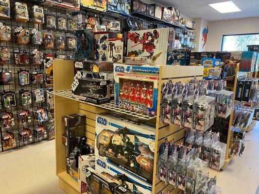 One of our main lines is Star Wars! We have a whole wall full of figures as well as vehicles, sets, packs and more!