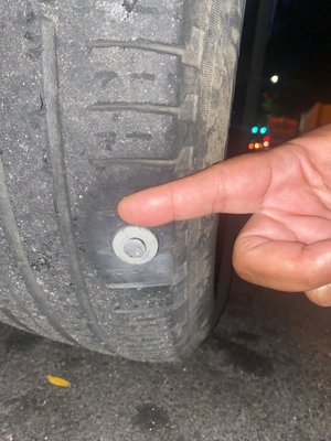 Huge nail in my tire!