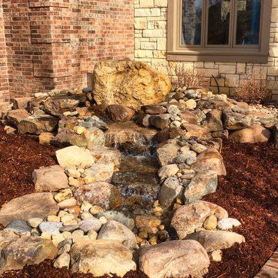 Front yard bubbler pondless waterfall