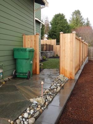 Flagstone path, new cedar fence, and total landscape renovation