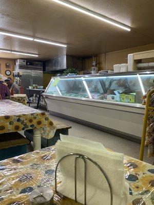 Photo of the meat case, where the cook/owner gets the fresh meat to cook from the case.