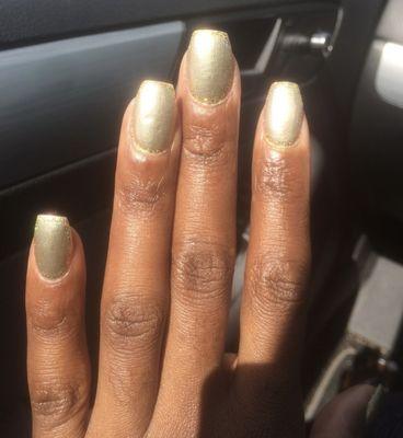 Light gold nails with dark gold trim