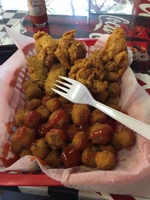 Delicious! Lemon pepper chicken wings, gizzards, and okra. Fried in lite, crispy batter. Great staff!