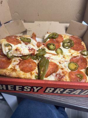 Pepperoni lunch special with jalapeños.