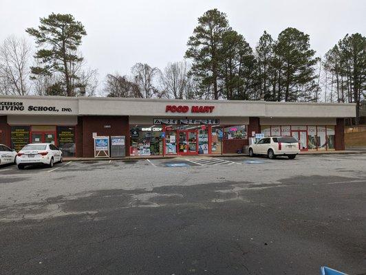 Outside the convenience store. Food Mart.