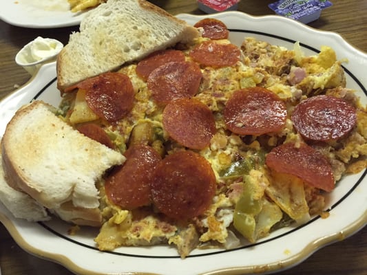 Nicks 'Fretta' It's a Frittatta. Italian sausage, ham, potato, eggs, onions, peppers, pepperoni and Italian toast.