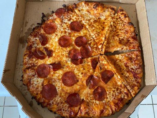 I ordered a large pepperoni pizza. I didn't order part of it plain cheese. Did they cut the pizza in high seas?