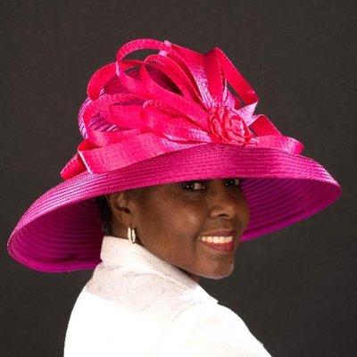 Make a statement in this beautiful pink satin dress hat