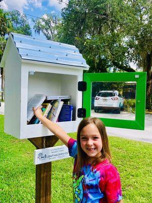 My best girl dropping off some books at her favorite Library.