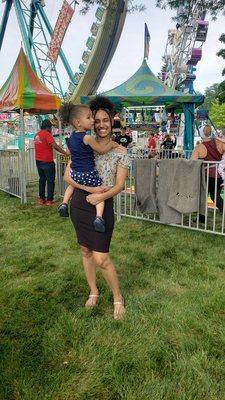 My daughter and grandson taking the finale pic in front of all the rides.