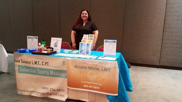 Sharing information and offering complementary chair  massage for the Moody Gardens Employees at the Wellness Fair.