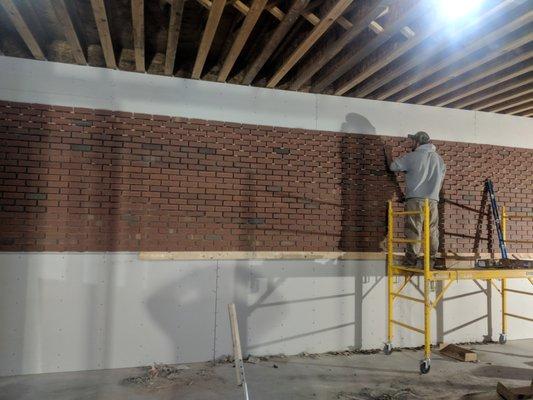 Red brick wall installation