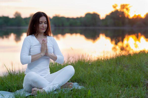 kundalini yoga and meditation student in Prayer Pose