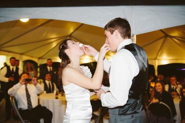 Cake Cutting fun at the Oak Ridge Lodge wedding in Mt Airy Forest