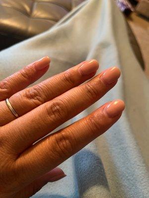 Dip manicure in a nude color three weeks later.