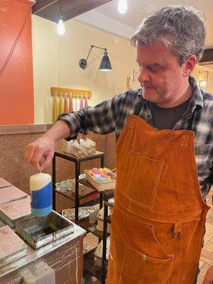 Our founder Paul makes candles daily right in the store! Come by and say hello.