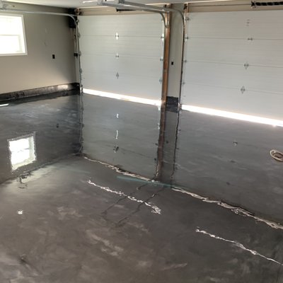 Metallic Gray Epoxy is one of many Garage Floor Sealing options available.