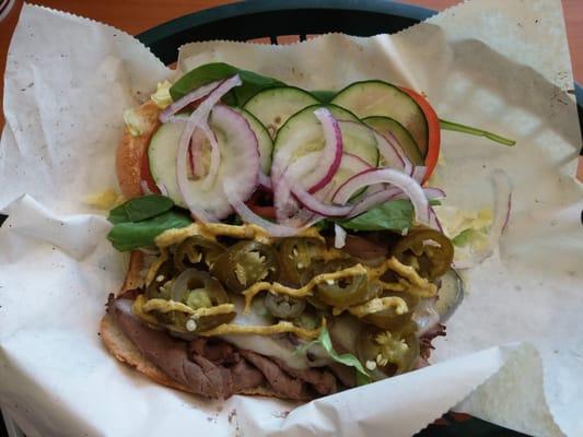 Roast beef on jalapeno cheese bread with all the veggies and extra jalapenos toasted with Swiss cheese..........  Heaven