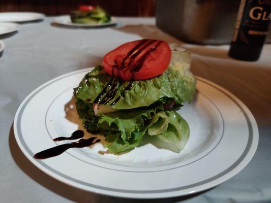 Artisan salad with balsamic glaze.