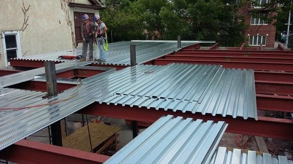 Picture of a new building project installing all beams and steel decking