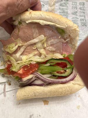 Cold Cut sub with 3 slices of very thin meat.