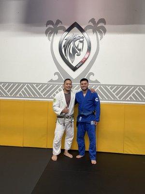 Receiving my blue belt from Coach Bryant