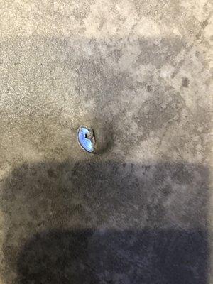 Screw coming up through floor