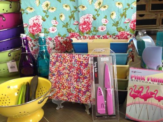 Brightly colored kitchen gadgets!  Tea towels, Colanders, Knives, Cutting Boards, Decorative bottles, lots more!