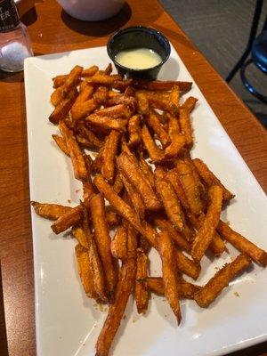 Sweet potato fries with mango coconut sauce.