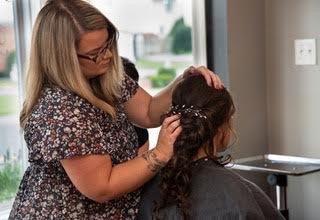 Tasha doing hair for a bride