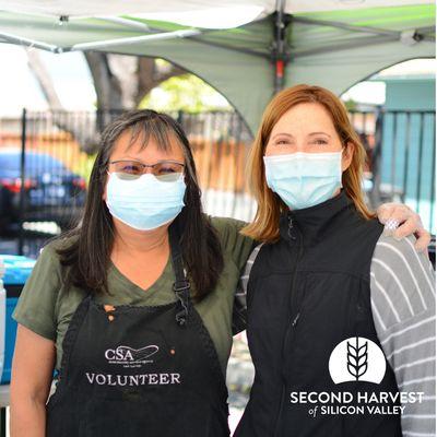 Volunteers Connie and Terri at our free grocery distribution site at Community Services Agency in Mountain View.