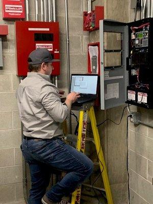 Final documentation and programming of a fully addressable fire alarm system.