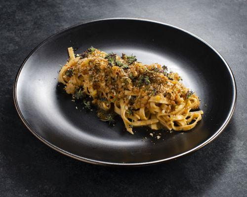 Calabrian Chili infused tagliolini - pork bone broth- nduja- shrimp and scallop "ragu" - lemon zest - toasted bread crumbs