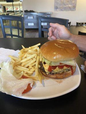 Cheeseburger with fries.