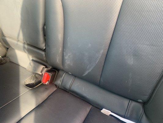 Stains still on the back seat after they cleaned