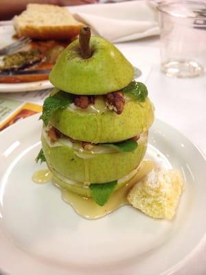 A pear topped with deliciousness for the cooking class (ratatouille in the background)