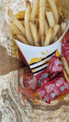 Fries and ketchup on top