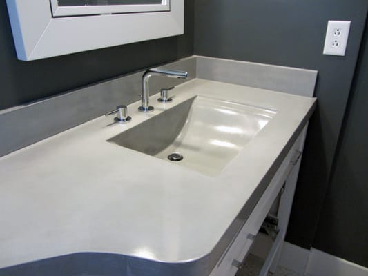 Beautiful concrete integrated wave sink and vanity top!