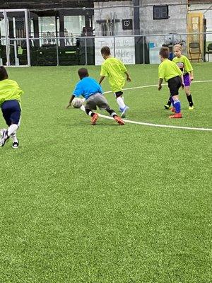 Youth indoor soccer training.