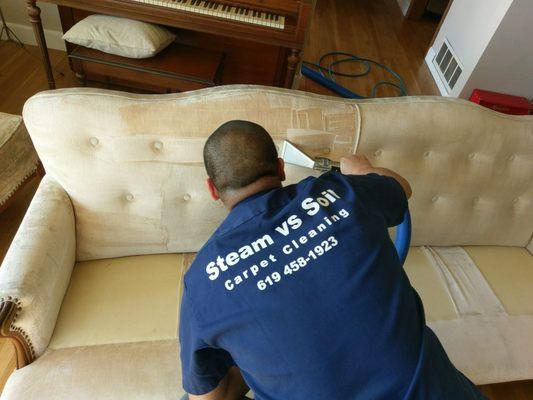 Svs technician making a couch look new again