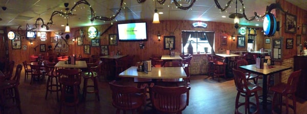 High top tables by the bar.