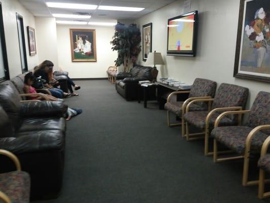 inside waiting lobby with TV n magazines