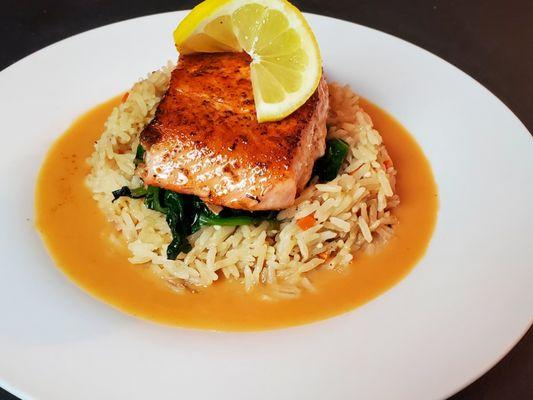 Blackened Salmon w/Rice Pilaf & Sautéed Spinach. Served with a Cajun Beurre Blanc