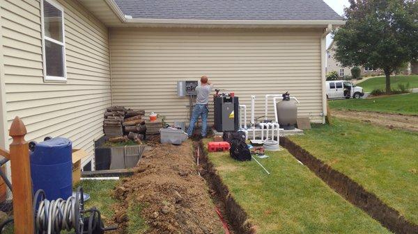 archibald electrics employee working on a outdoor panelboard