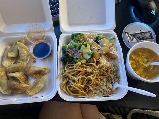 Potstickers, half rice, half noodles with mayonnaise shrimp and beef broccoli. Egg drop soup.